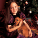 One lucky girl on Christmas morning, 2008, with the puppy whose corpse is currently being turned to ash.